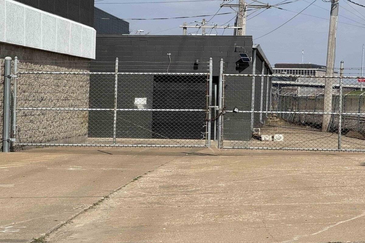 Secured chain-link gate at property entrance