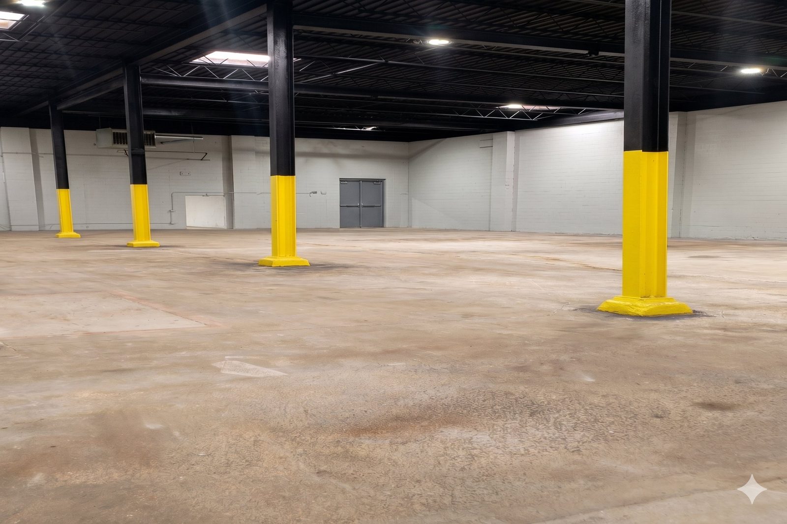 Open warehouse floor with structural columns